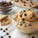 cottage cheese cookie dough in a clear glass bowl close-up