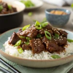 Mongolian beef recipe served over white rice
