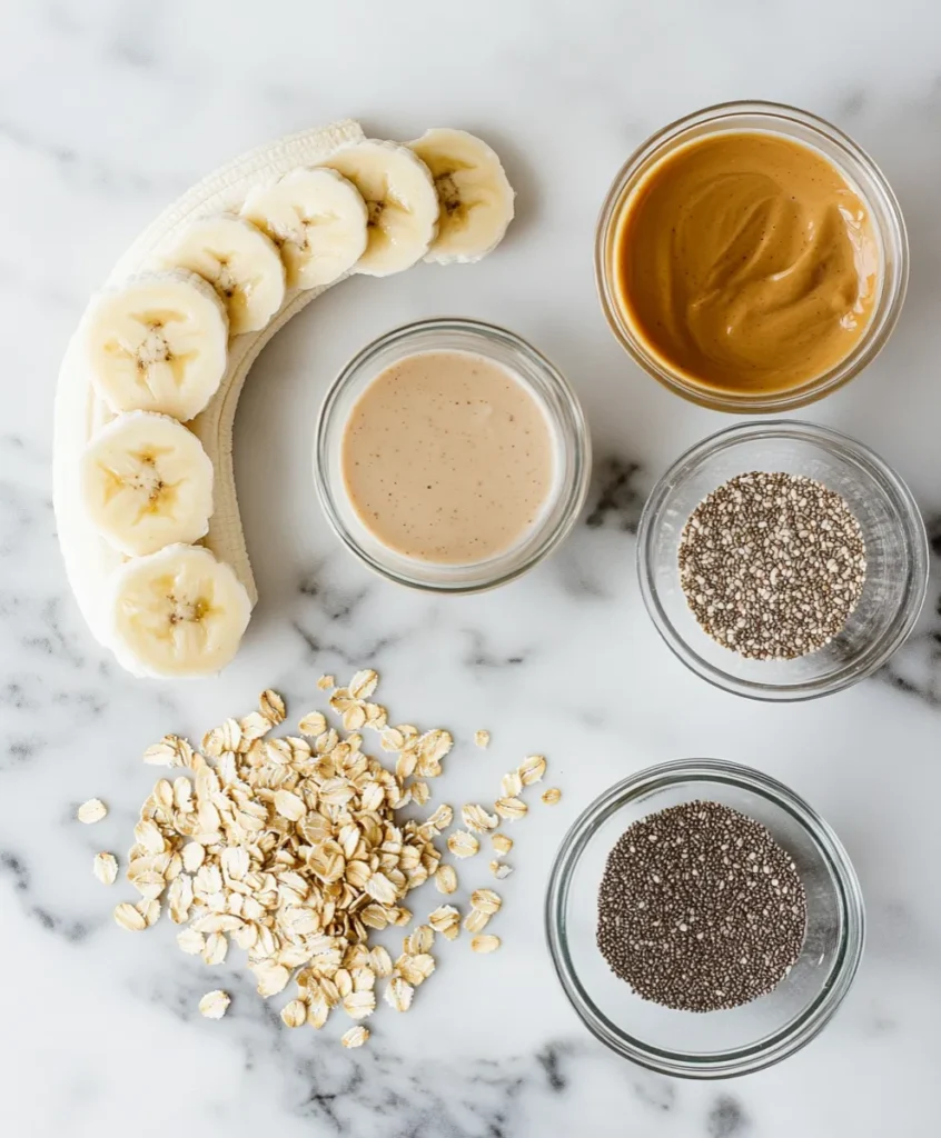 Peanut butter banana smoothie 7 ingredients for peanut butter banana smoothie on marble counter