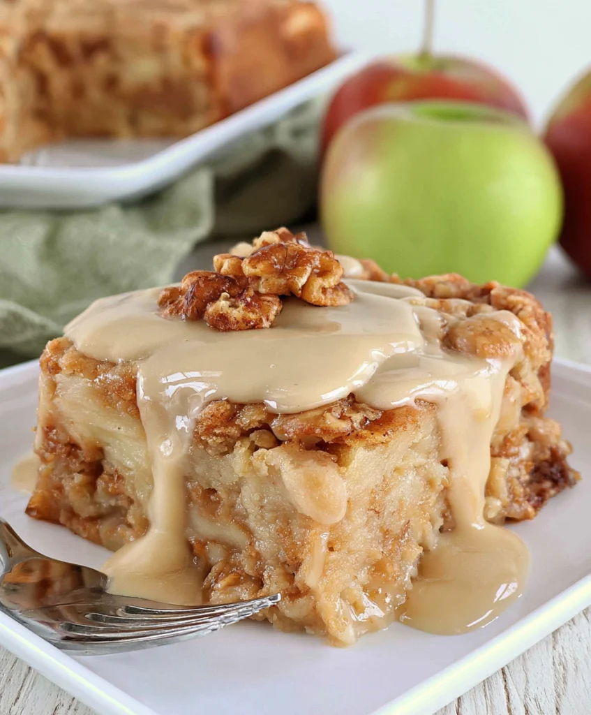 Apple Dapple Cake slice topped with brown sugar glaze