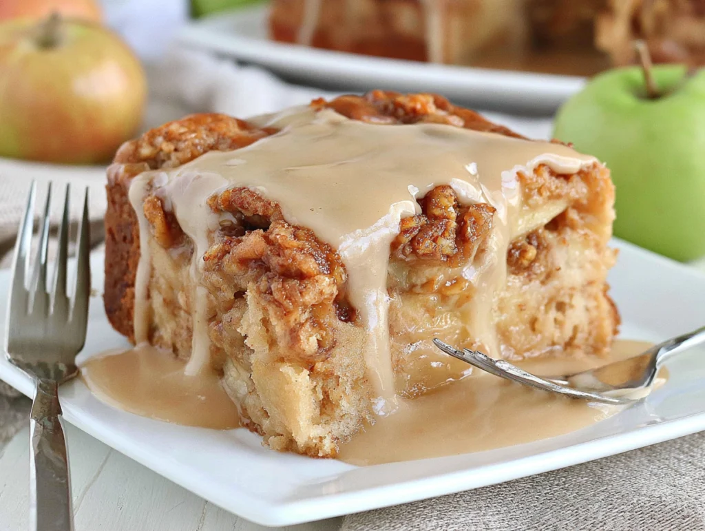 Slice of Apple Dapple Cake with brown sugar glaze