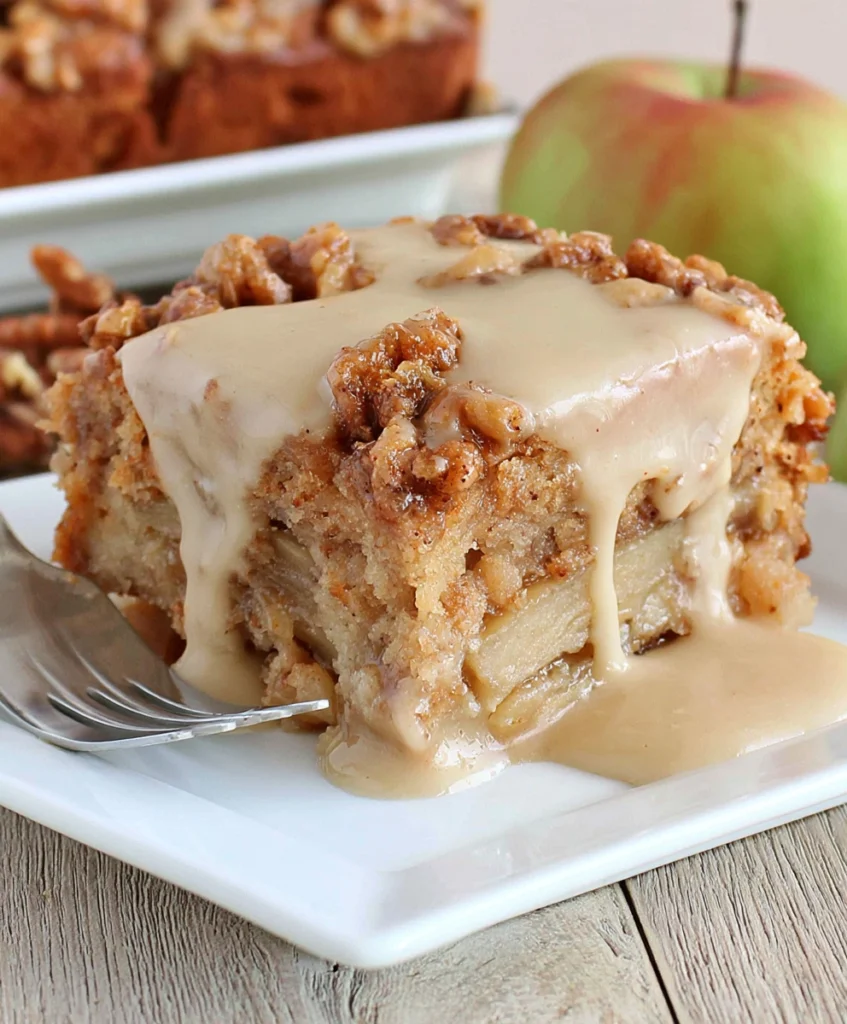 Moist Apple Dapple Cake slice with brown sugar glaze